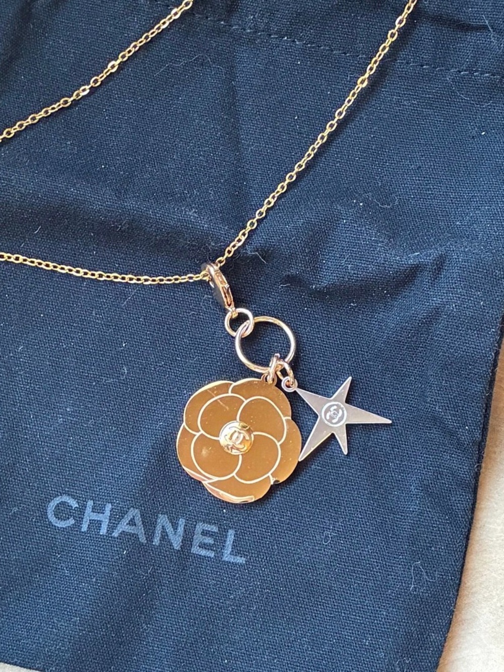 CHANEL Gold Camellia & Star Charm Pendant Necklace - Gold